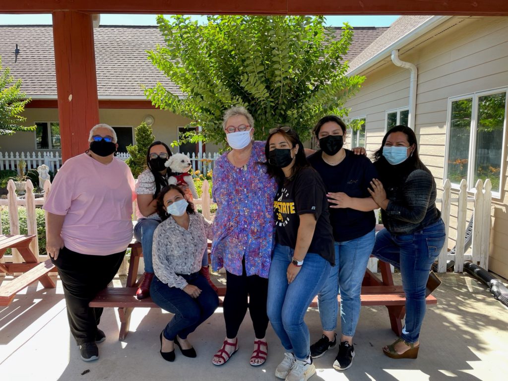 Linda Stout (center) and Bethsaida Ruiz (far left) meet with the Episcopal Farmworker Ministry, Dunn NC